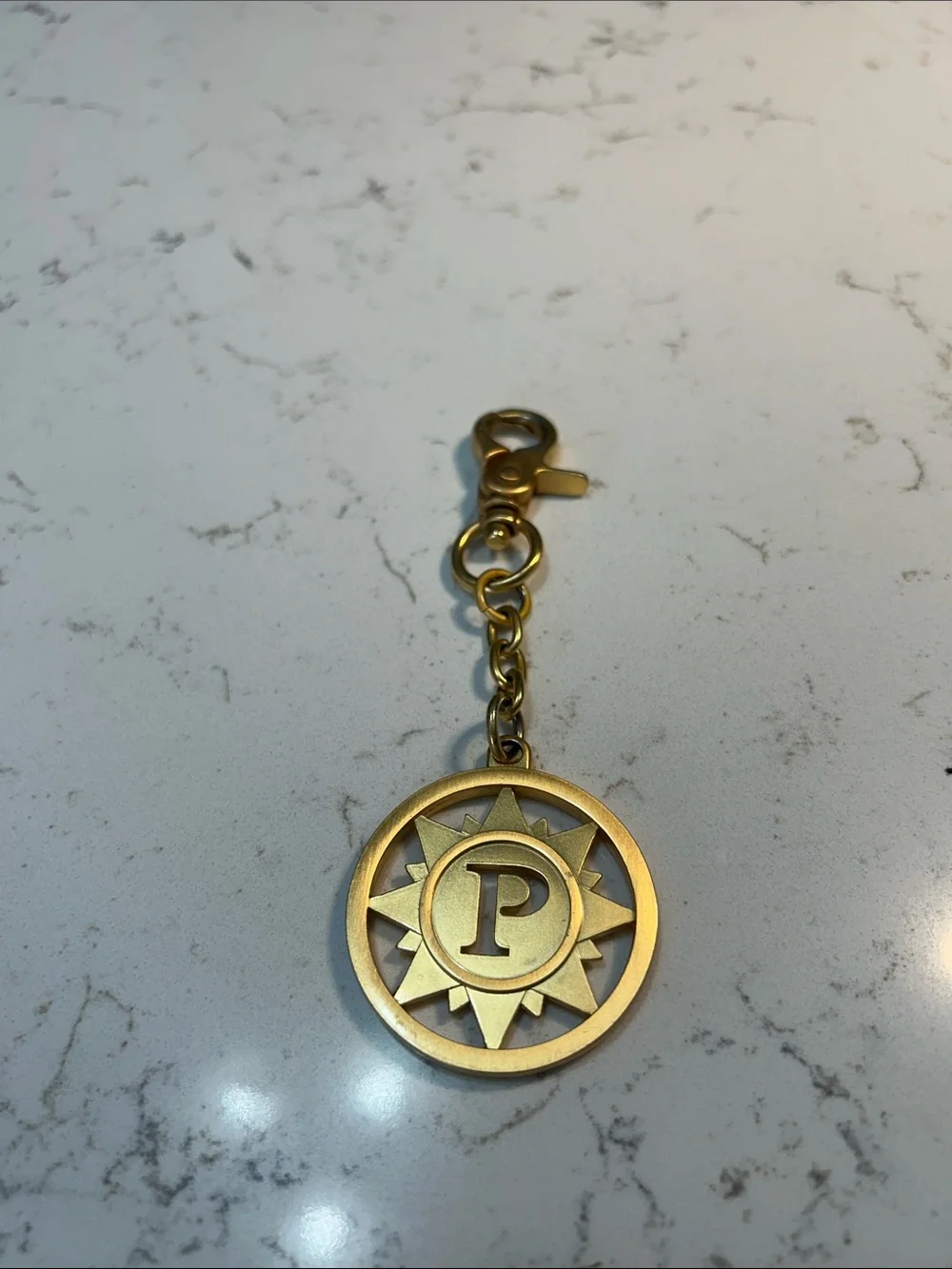 Gold-Tone 'P' Sunburst Keychain Charm